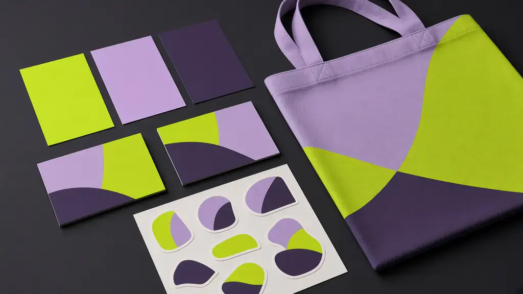 Nightjar stationery, stickers and a tote bag using the lime and lilac shape system